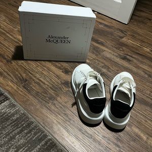 Black and white sued Alexender McQueens